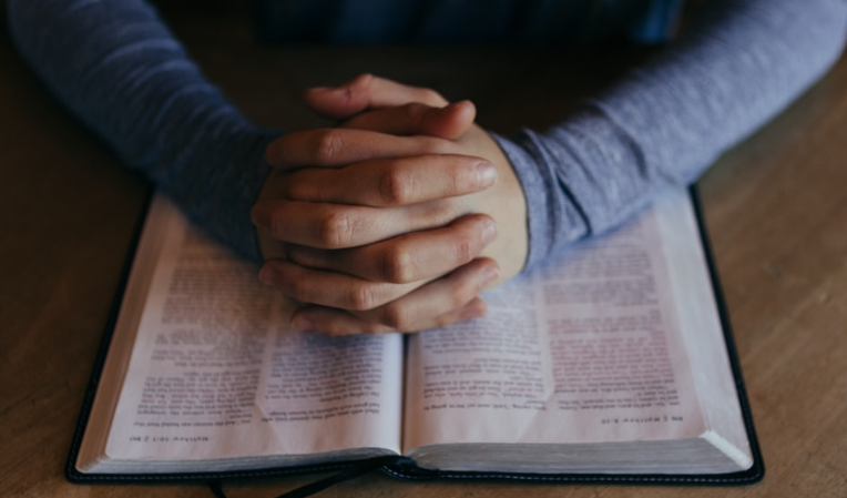 Bible Hands Praying