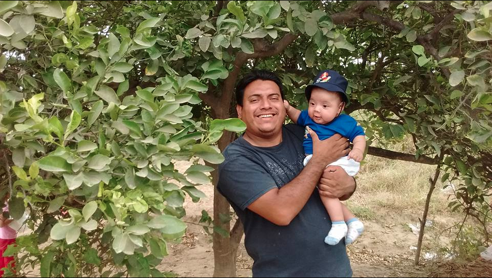 Jose Luis Siancas With His Son